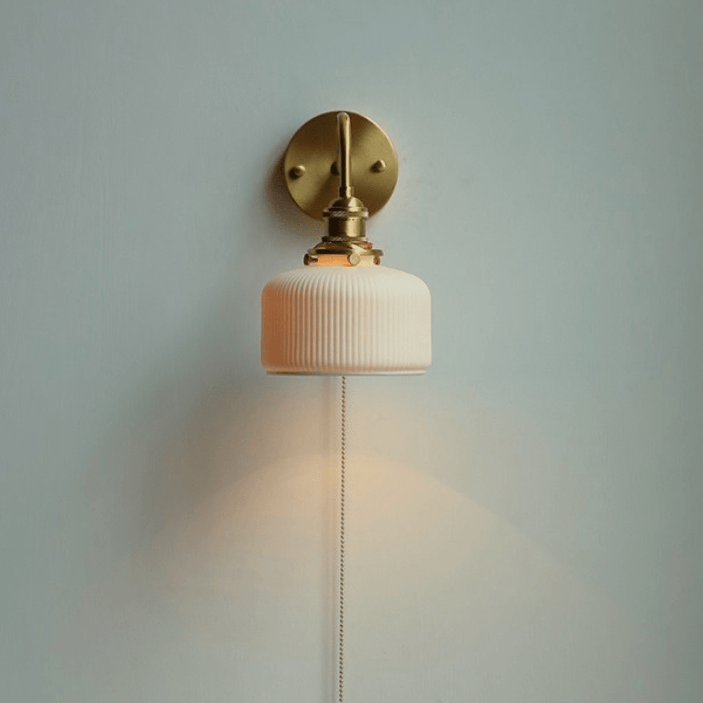 White Ceramic Wall Sconce with Pull Chain Switch Lighting Decluttered Homes