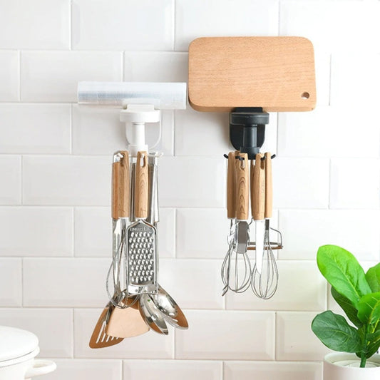 A kitchen utensil hook in use, holding wooden cooking tools, mounted on a tiled wall