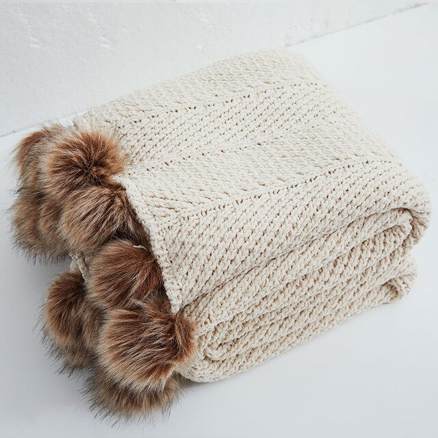 Throw blanket with online pom poms